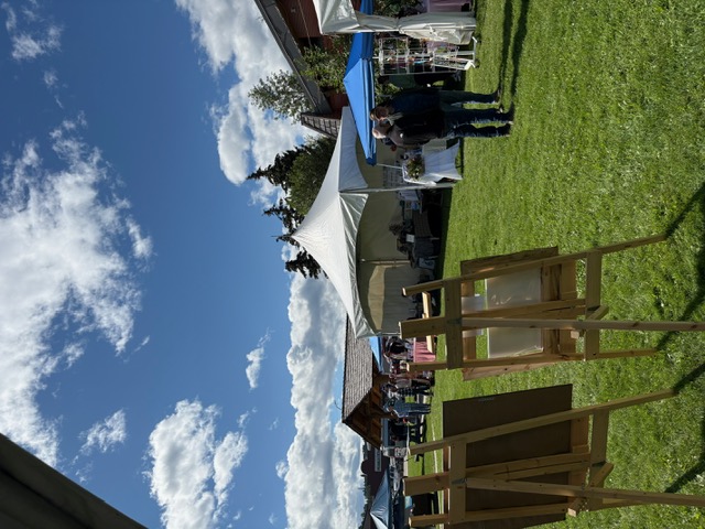 Visitors exploring booths at the Hinton Art Walk
