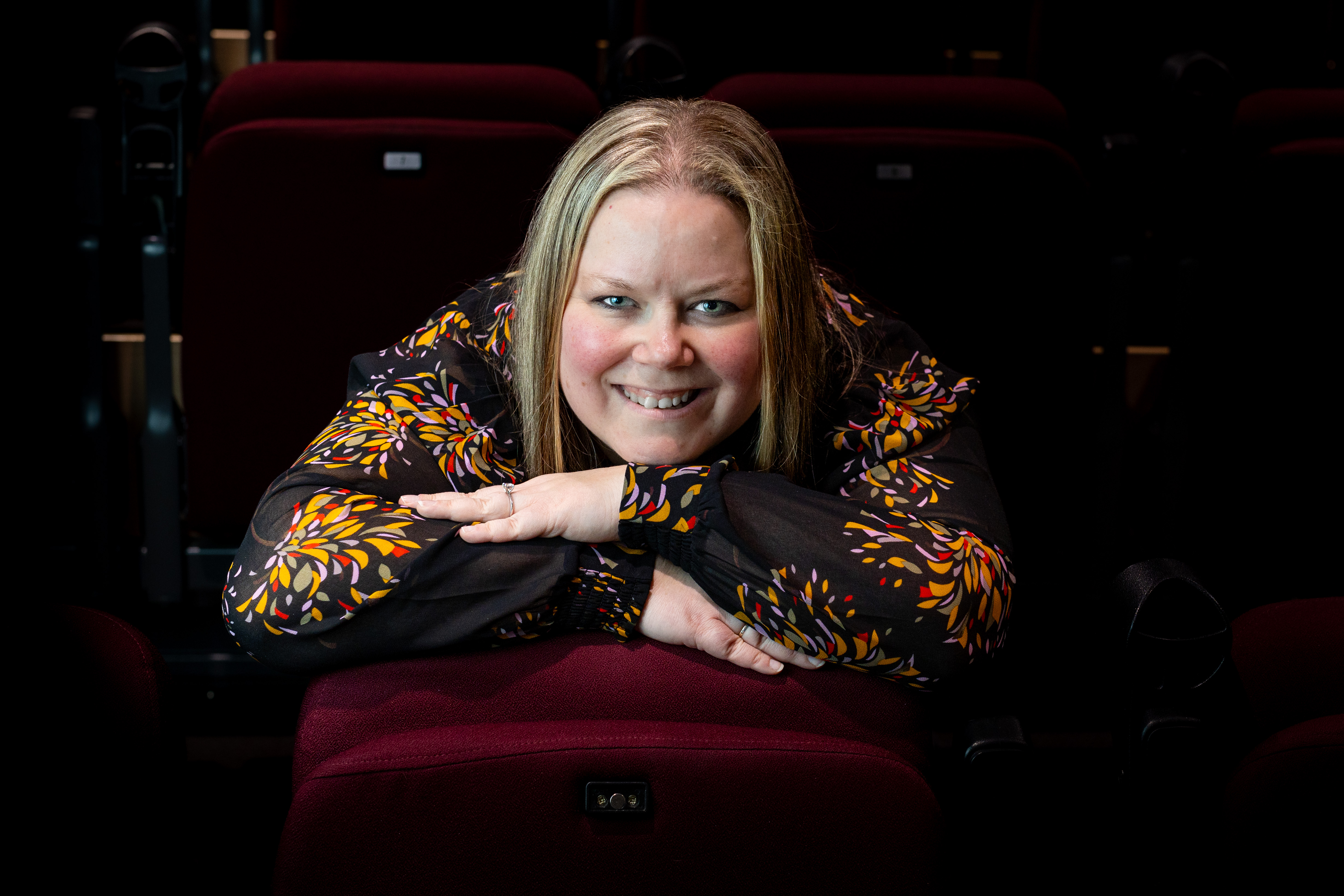 Christina Oliver leading a community theatre cast