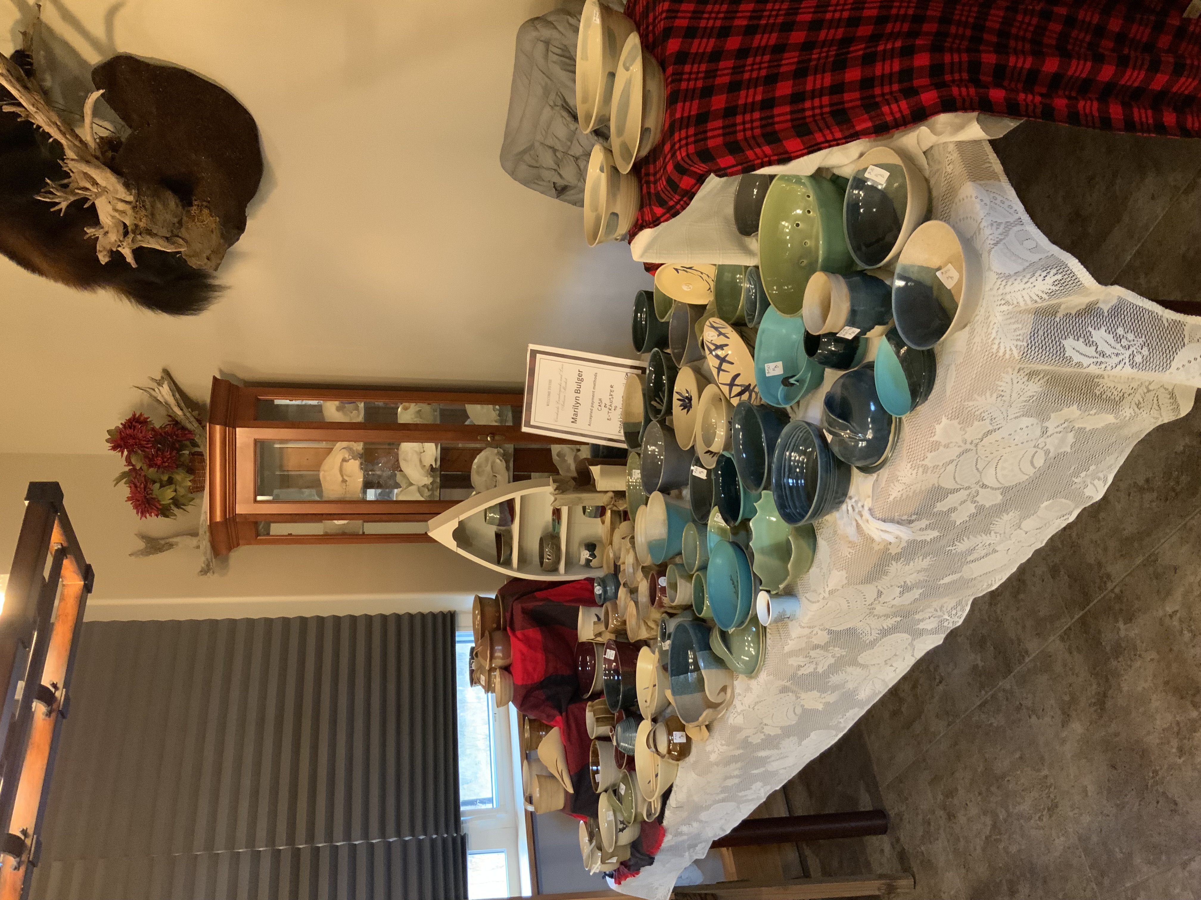 Marilyn chatting with shoppers at a local artisan market